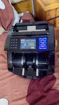 عدد نقود للبيع مستخدم 3 اشهر  يحسب جميع العملات عراقي دولار ويكشف المز...