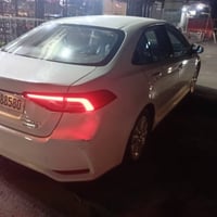 كورله هايبرد مديل ٢٠٢٤ مكفوله سياره بيها ملاحضات داكرهن بالفيديو للبيع...