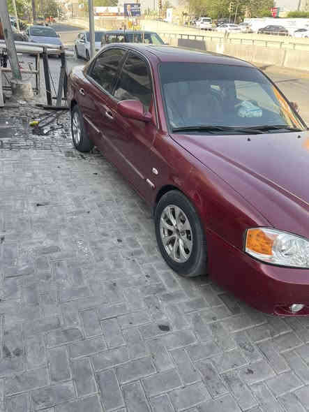 السلام عليكم كيا اوبتمه ٢٠٠٤ وفود رقم بغداد مشروع وطني هزه جديده مكينه ٦ سلندر ٢٧٠٠ كير مكينه مكفولات تدفه تبريد صدر جديد  تخم تاير دلوب جديد باتري جديد مكان السياره بغداد السعر ٦٥$ورقه ***********
