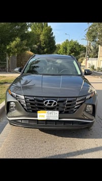 توسان هايبرد 2022 رقم بغداد  ماشية 50 ميل  حادث فقط جاملغ ايسر بدون اي...