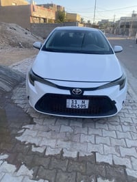 للبيع كورلا 2020 امريكي LEرقم بغداد معروفه مواصفاتها محرك 1800 ضررها م...