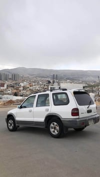 كيا سبورتاج • ٢٠٠٠ • رقم اربيل