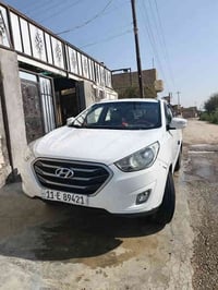 توكسان موديل ٢٠١٣ للبيع نص فول مكفوله كير ومحرك بلادي مكفوله من الحادث...