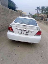 كامري 2006 صبغ حزام الجمالية محرك 2400  رقم بغداد السعر 105 وبيها مجال...