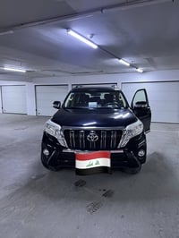 للبيع 🚘 تويوتا برادو 6 سلندر – أسود 2014  ✅ ممشى 101 ألف كم فقط  ✅ مكف...