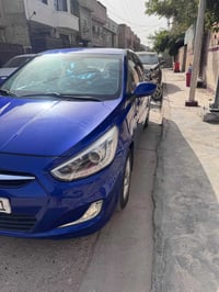 اكسنت خليجي 2015  محرك 1400  رقم بغداد دولي  سنويه بأسمي  3قطع كلير بد...