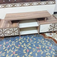 ميز بلازما • طاولة تلفزيون