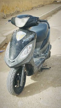 كامكو V2 • موتوسيكل