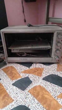 أوفن أصلي • شغال كامل • جامه أمامية مكسورة