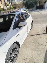 من رخصه الادمن  للبيع فقط  للبيع تويوتا كورلا تجميع صيني هايبرد2024 شك...