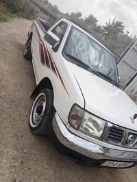 نيسان 2002كير ومحرك واكسل مكفولات بسمي بغداد انكليزي تحويل مباشر السيا...