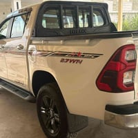 تويوتا هايلوكس موديل 2024 فول مواصفات مكفوله من ضربه وصبغ معروضه 35 لل...