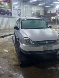 للبيع كيه ريو مديل 2003رقم بغداد مكينه كير صدر تبريد كهربائيات كله شغا...