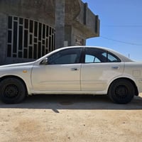 صني 2001 • محرك 1800 • رقم بغداد