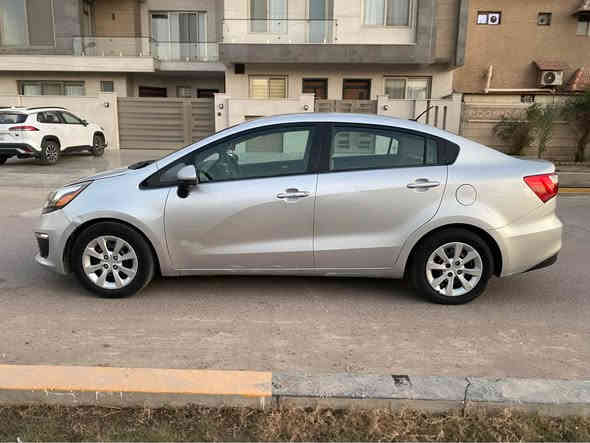 كيا ريو موديل 2017 وارد امريكي محرك 1.6حادثه فقط خشم بنيد بدون ايرباك  ماشيه 86 بسمي سياره سنويه جديده سياره فقط نص بنيد صبغ بيه اتصال *********** سعر 90 بغداد
