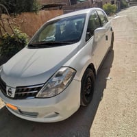 تيدا ٢٠٠٩ • محرك ١٥٠٠ • بدون صبغ