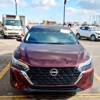 نيسان سنترا موديل 2024 sv ماشية ١٢ الف ققط لون عنابي  المواصفات :- بصم...