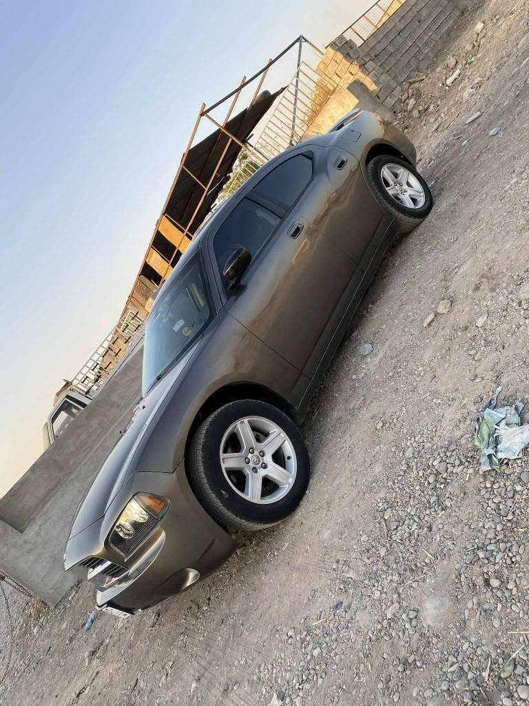 دوج موديل 2011 ليزه ري دوبه ي پيشو پاش كه پس بي ليدانه سه ياره كه تابلي جوانو خاوينه بي مه سروفه  تاخم پيشو پاش نويه جركه و سه د دولار بشكينه يك دينار مه سروفي تيا نيه لايت زينون ته بريد كوشن جلد كاره باي جوار تايه و ويلي نوي له ژيره مه كينه 3/5 مه رغوب گيرو مه كينه و دارو به ردي به شه رته كاره باي هه موشته ك به شه رته سه ياره كه تابلي جوانو خاوينه شوين هه ولير خه بات سعر 47 مه جاليكي كه م ژم *********** أربيل, العراق
