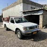 نيسان بيكاب • ٢٠٠١ • سه يد سادق