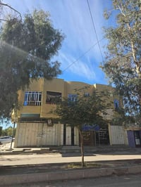 عمارة تجارية • حي البشامان • عائد شهري ٢مليون