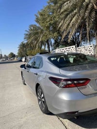 للبيع كامري 2023 LE هايبرد صور الحادث مرفقة بالمنشور ماشية 54 مايل سيا...