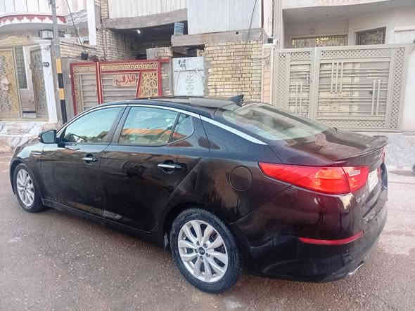 كيا اوبتما موديل ٢٠١٤ وارد أمريكي بيهه ٣ قطع صبغ مكينه وكير تبريد تخم تاير صدر جديد رقم بغداد مشروع وطني سنويه جديده مكينه ٢٤٠٠  سعر ٩٠ *********** بغداد
