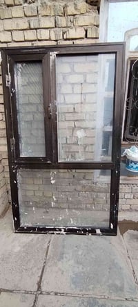 شباك المنيوم عرض 150 وطول 200 مكان شعلة دوانم 07736008648 السعر ١٠٠ وب...