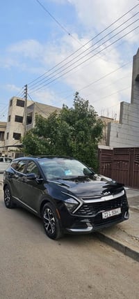 سبورتاج موديل 2023وارد أمريكي الضرر شويه من الجاملغ والباب الخلفي صبغ ...