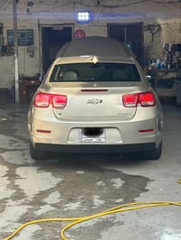 ماليبو ٢٠١٤ فول عدا البصمه رقم بغداد باسمي  السياره بيها رش حزام توحيد...