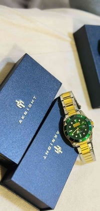 ساعة رجالية • ضمان ٥ سنوات • مينا أخضر