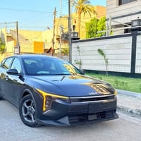 KIA K4 2025 LX وارد امريكي بصمة  / هندبريك دكمة  / لايت LED  / مكينة 2...