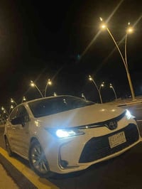 TOYOTA   COROLLA Hybrid   موديل   2021  مرقم بغداد ب اسمي   ماشي 16700...