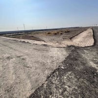 عرصة ٤٠٠م • طابو زراعي • مقابل قاعه الاسراء