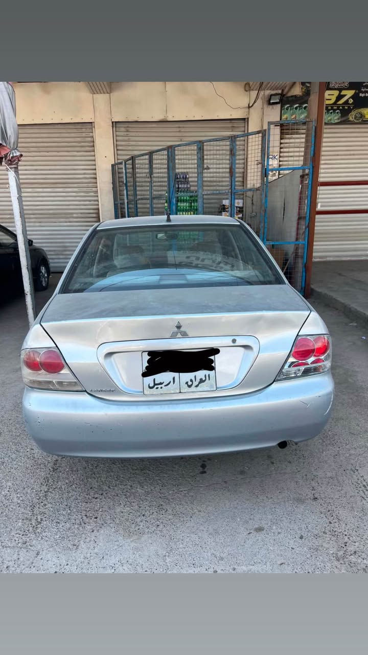 لانسەر مۆدیل ٢٠٠٩ تۆماتیک  گێر و مەکینە تەبرید بە شەرت سەنەوی و ھەزەی بەسەرچووە رەقم کۆن دوو پارچەی تەنیا ساردە کوتە رەقم موبایل ***********.  ھەولێر Singapore
