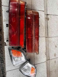 سكنات حاويه اصلي  مع بك لايتات نظاف  السعر 250 الف 07802667852