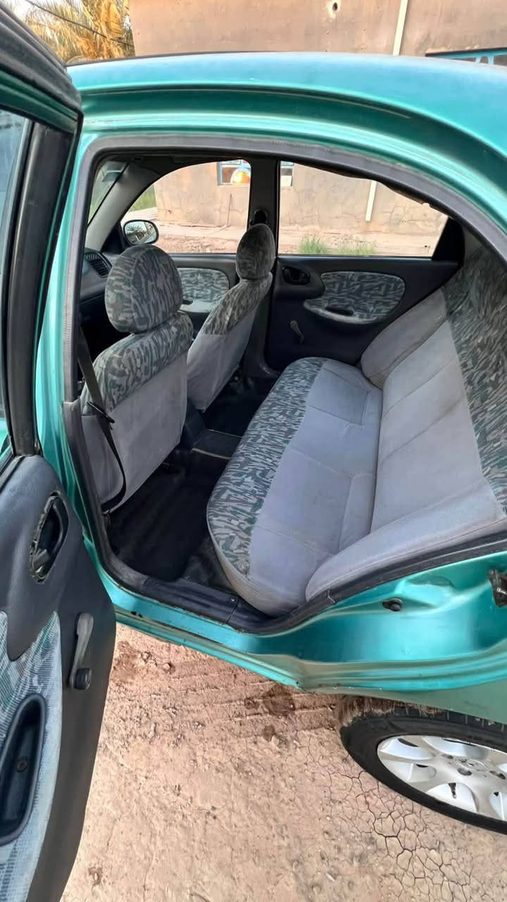 (مكلف بلنشر ) دايو لانوس موديل 97 السيارة نضيفة وجاهزة كير عادي صدر امامي خلفي جديد تخم تاير جديد تبريد ثلج  مكينة وكير مكفولات مكينة لاتبخير ولا تنقيص كهربائيات كلها كامله وشغالة سعرها 28 وبيها مجال وباسم راعيها هذا رقمة ‭***********‬ 

‭***********‬
مكانها بابل حصوه
