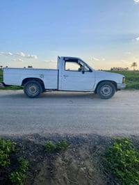 نيسان بيكاب • ١٩٩٠ • رقم اصفر