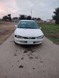 بروتون • ٢٠٠٢ • رقم صدامي