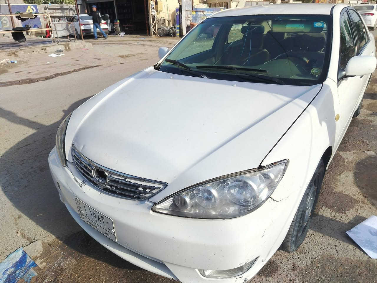 السلام عليكم كامري ٢٠٠٦ للبيع بسمي السياره الحمدلله ممتازه كير ومكينه وتبريد قبل فتره شادهم والكشر يرادله ملاحضات بيهه حادث جاملغ الخلفي ومعدل وطخه جاملغ الأمامي رايدهه٧٥وببهه مجال بسيط الرقم *********** مكاني بغداد الشرطه الخامسة
