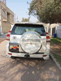 برادو  موديل 2013 كويتي  محرك 6 سلندر  دبل تانكي   رقم بغداد   مواصفات...