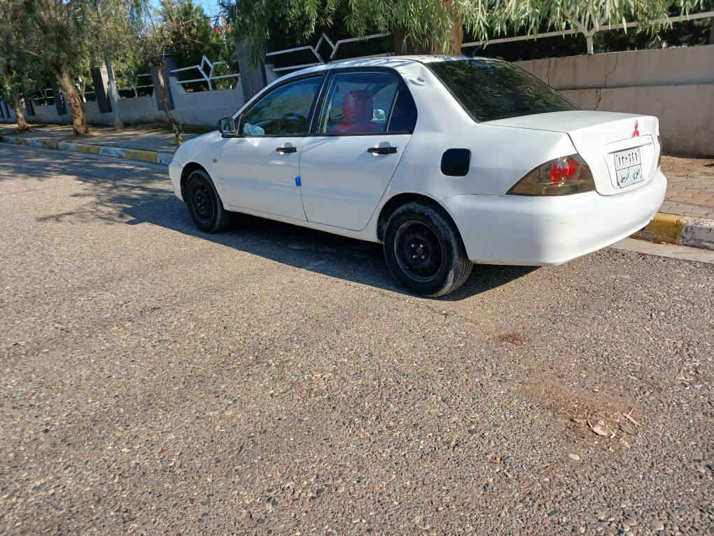 لانسر٢٠٠٧كيرعادى عام بوياغه ليدرانى قورسى نيه كيرمكينه تبريد تحويل به شه رت مكينه كه ميك بوخارى هه يه سه نه وى به سه ر جوه نرخ60ورقه *********** شقلاوة, أربيل
