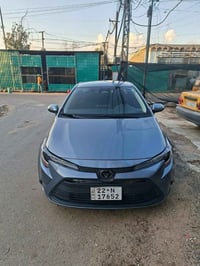 تويوتا كورلا ٢٠٢٣ للبيع فقط مواصفات امريكيه محرك ٢٠٠٠  تبديل فقط البني...