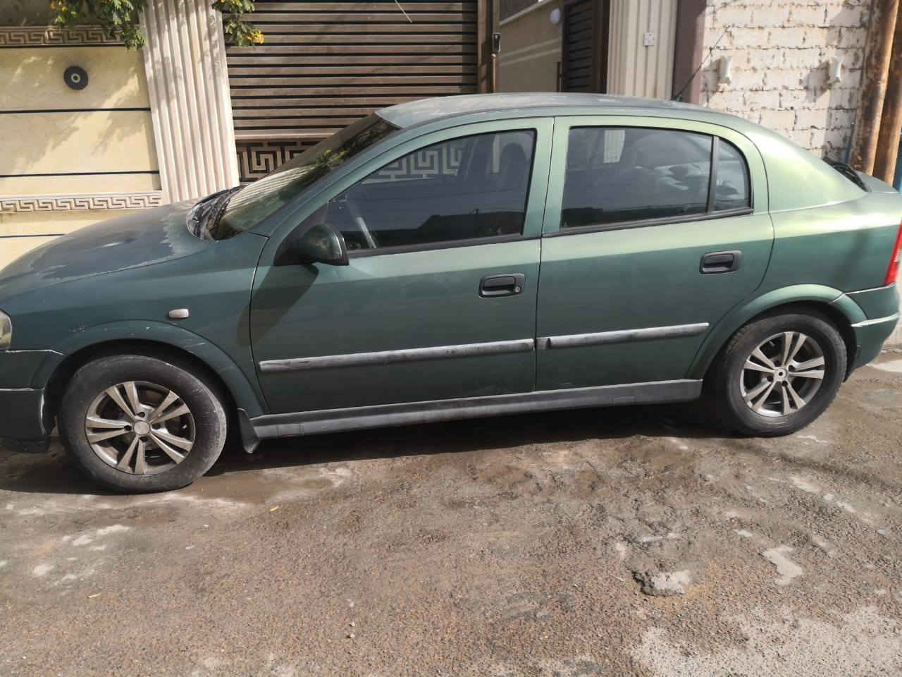 سلام عليكم اوبل استرا موديل 2002 سياره بلاديه مكفوله من ضربه  كير عادي رقم بغداد عنوان سياره بغداد عطيفيه سعر 52 رقم هاتف ***********
