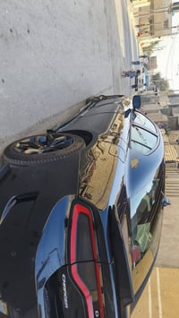 دوج تشارجر  sxt  موديل 15 رقم دولي بغداد باسمي محرك 6 سلندر 3600 ماشيه...