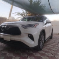 أخوان للبيع تويوتا هايلندر هابيرد موديل 2021  لون أبيض وارد أمريكي حاد...