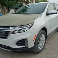 ايكونكس 2024  LT AWD  لون ابيض بجم كبس دخول جديد حادث سطحي قماره مسمكر...