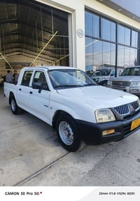 ميتسوبيشي L200 • موديل ٢٠٠٦ • رقم دهوك