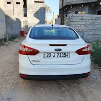 من رخصة الادمن  فورد فوكس موديل ٢٠١٢ قطعتين صبغ  السيارة جاهزة من كير ...