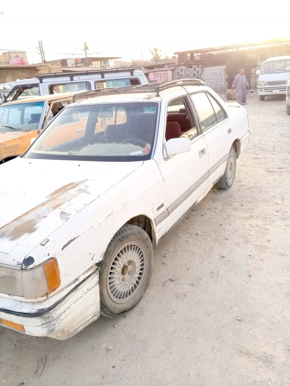 مازدا موديل 1993للبيع أو مراوس حسب قناعه راعيهه ثاني يوم يداور رقم نجف مكان الديوانية *********** مكلف بل نشر سعر 18بيهه مجال
