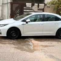 تيوتا كورلا خليجي بانزين فقط اصلي ساز ام الضمان موديل 2024 ماشية ٦٠ ال...